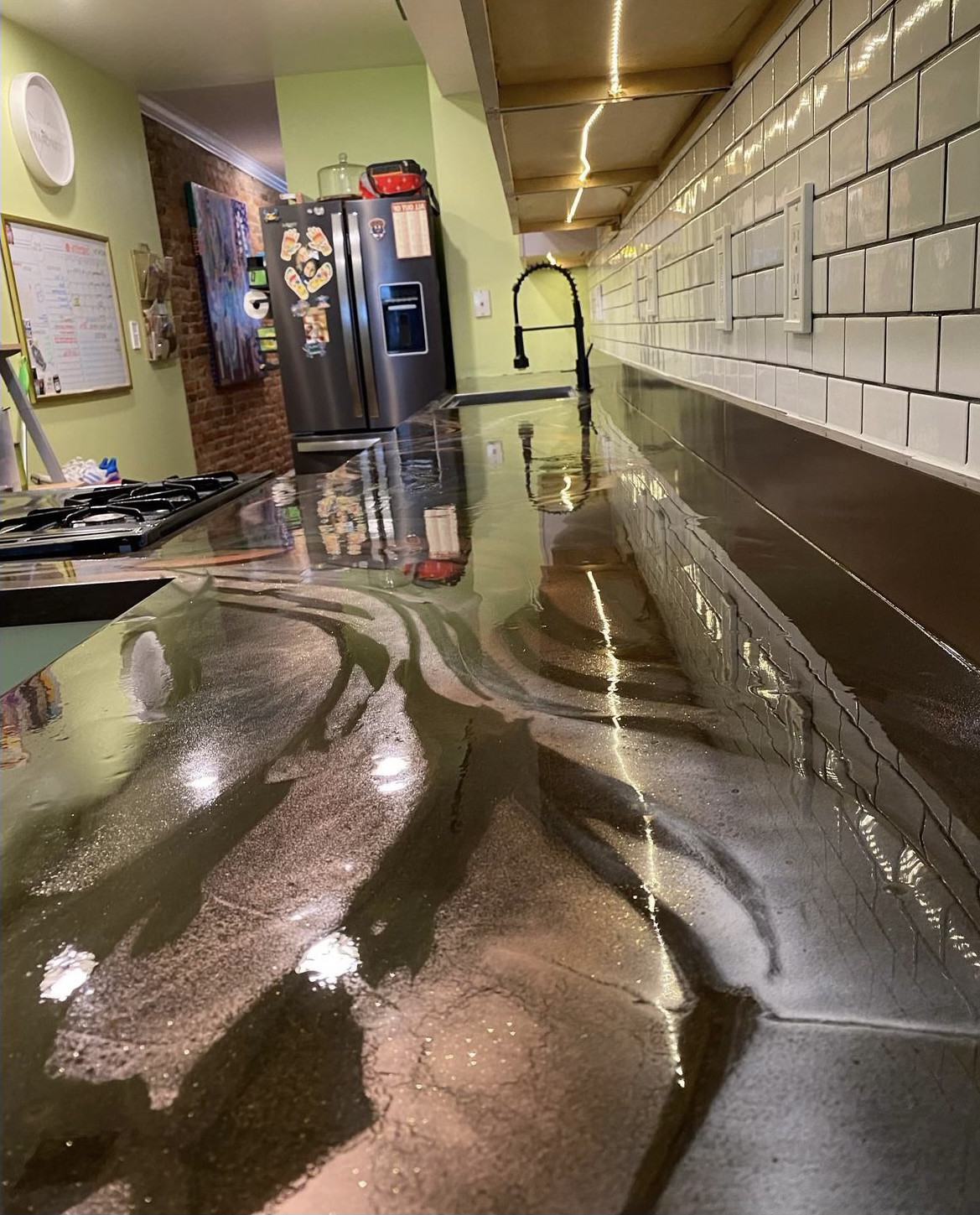 Project Gallery — Epoxy Floors & Countertops in Orlando - A1 Epoxy Coatings Black epoxy countertop with gold resin accents